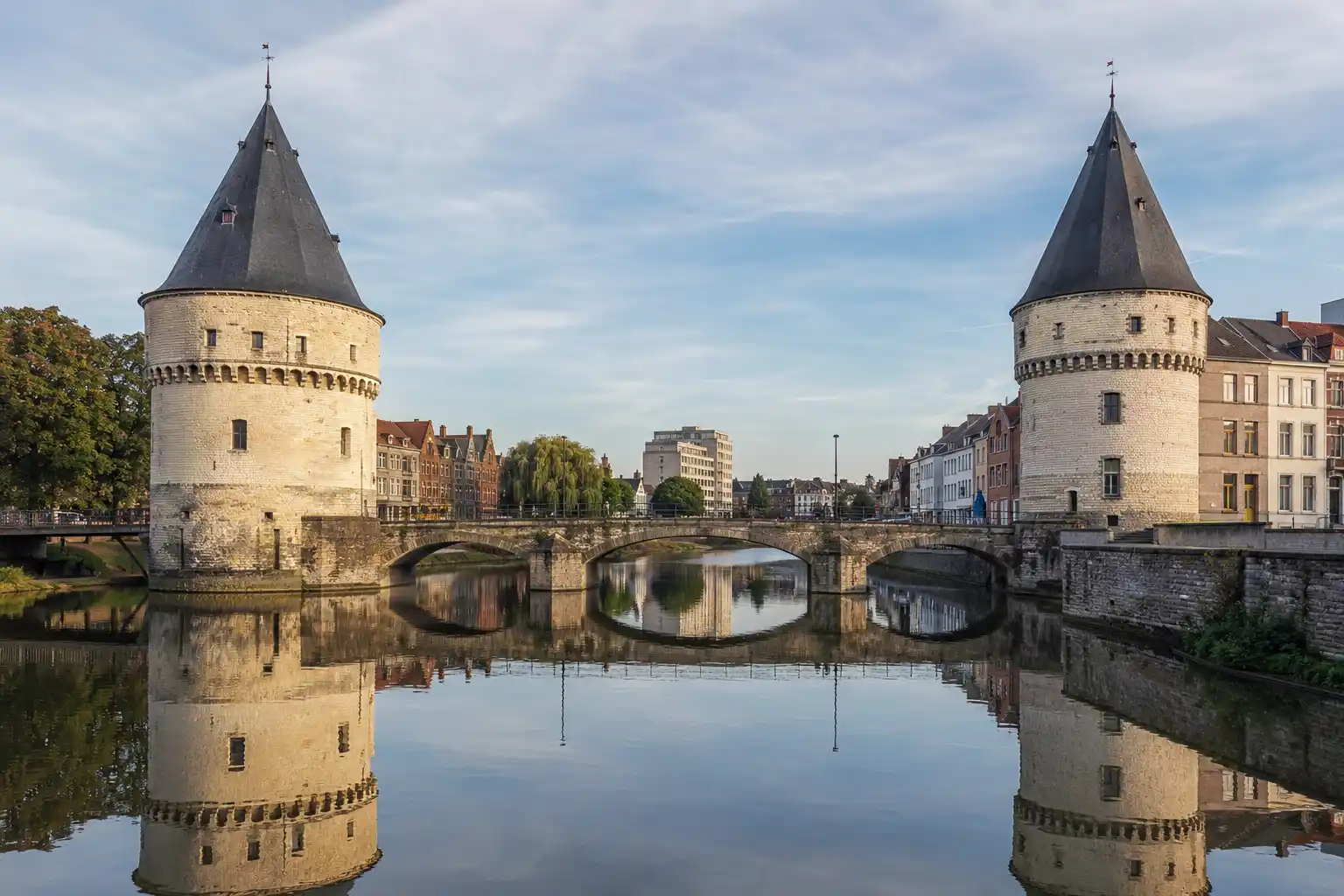 Broel Towers and the Lys river in Kortrijk, Belgium, near a Lille to Kortrijk private transfer drop-off